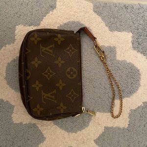 Authentic Louis Vuitton Wristlet mini bag